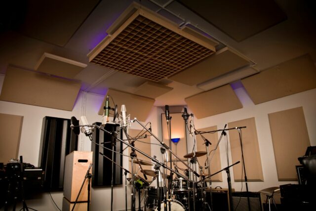 Recording studio with acoustic treatment and acoustic diffuser on ceiling