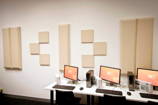 Beige acoustic panels on recording studio wall