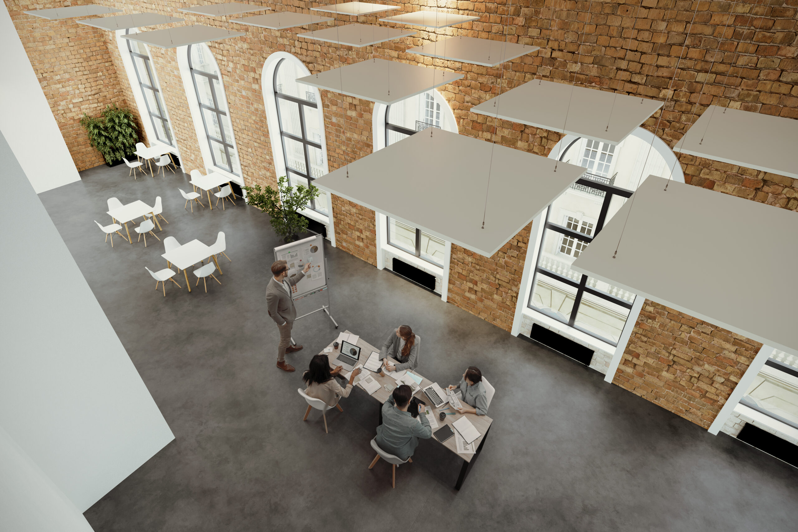 Leader Standing Near Flipchart And Pointing At Graphs